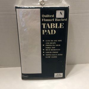 Quilted flannel backed table pad